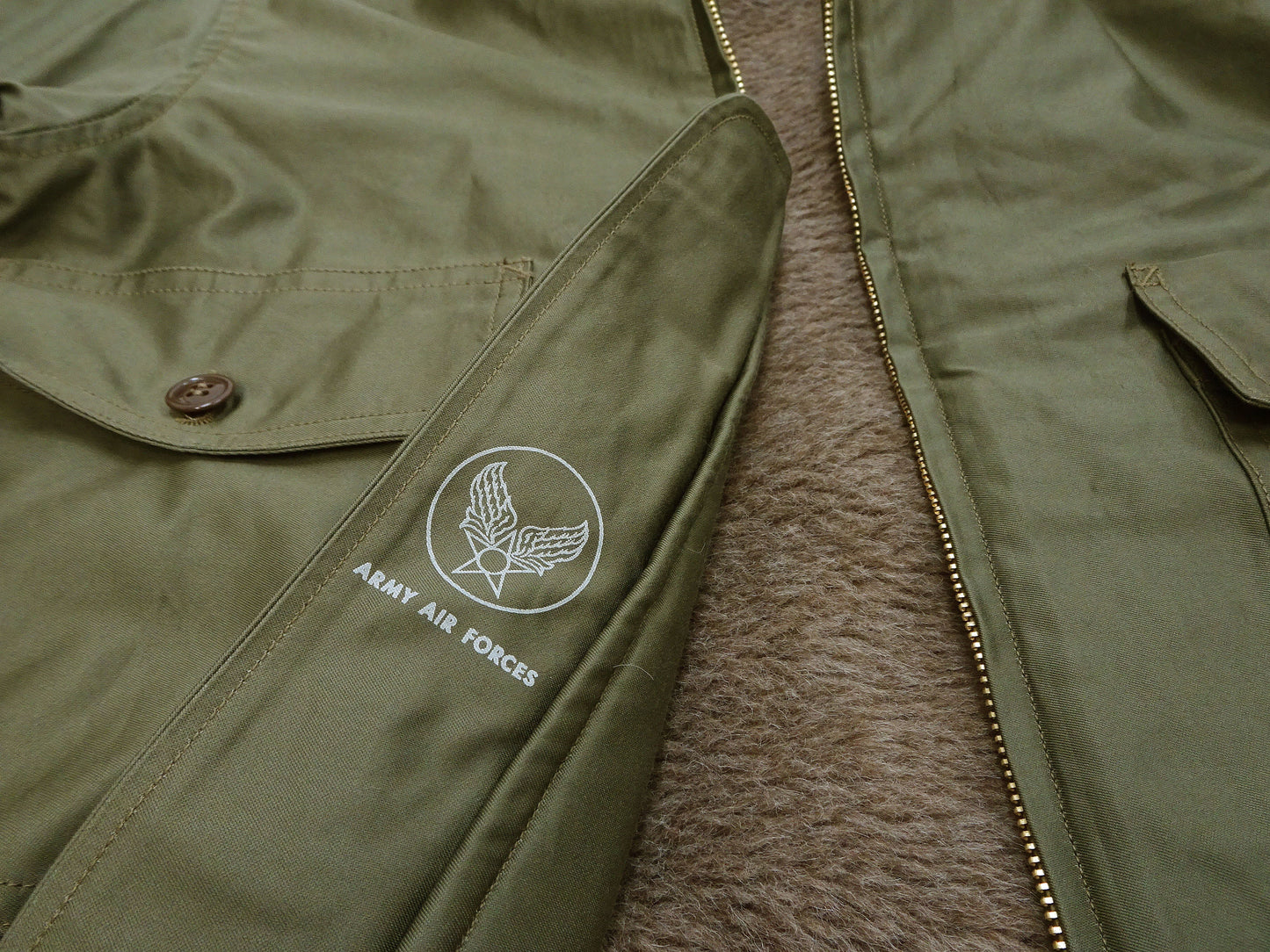 Buzz Rickson Men's B-10 Flight Jacket with Red Ribbed Trim - Superior Togs Co. Model - U.S. Army Air Forces WWII Cotton Bomber Jacket Reproduction - Made in Japan (BR15745 Olive Drab)